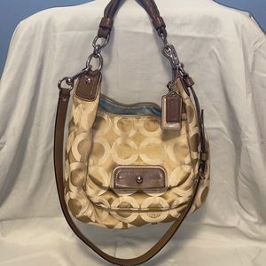 Signature Coach crossbody purse